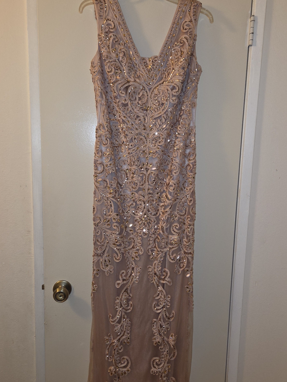Elegant Sleeveless Embellished Evening Dress with Bustle